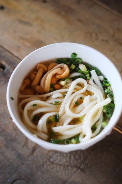 istock Dip udon noodles in udon soup. 1492221667