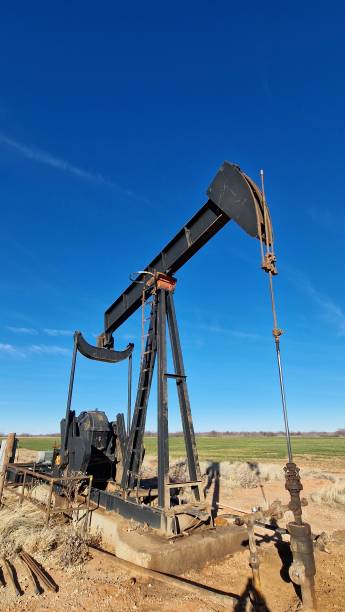 istock Oil pump jack working, Texas, USA 1492229363