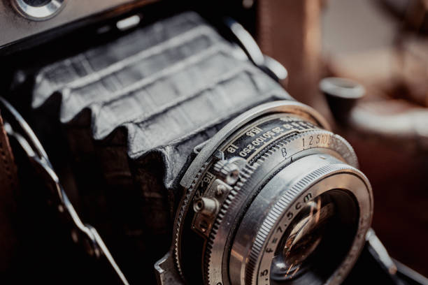 An old medium format camera with bellows lens from the 1940-50s close up.