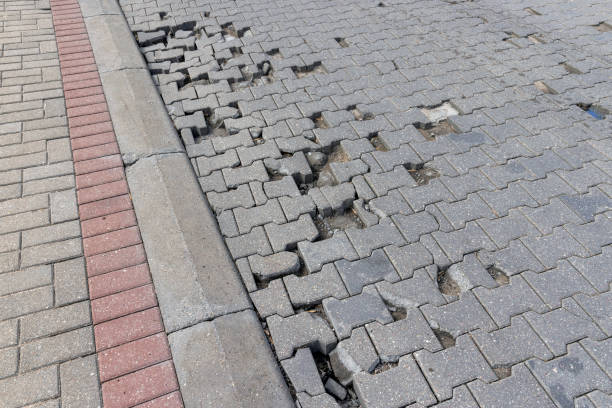 istock damaged and broken concrete tile road, close-up 1492241366