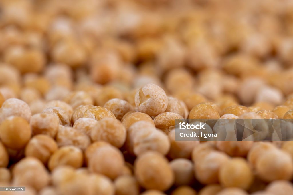 Dry hard yellow peas for cooking porridge Dry hard yellow peas for cooking porridge, dry yellow peas scattered before cooking Dry Stock Photo Dry hard yellow peas for cooking porridge Dry hard yellow peas for cooking porridge, dry yellow peas scattered before cooking Dry Stock Photo