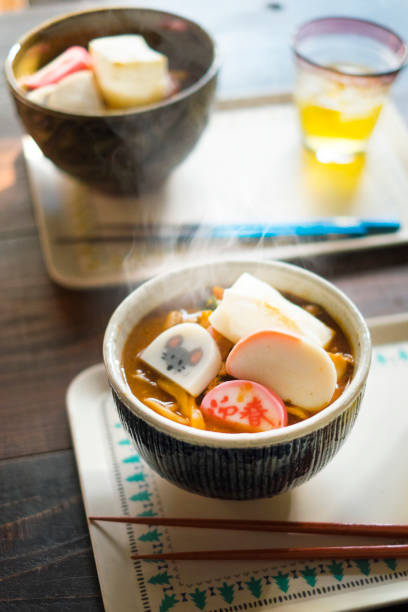 istock Udon noodles in a hot soup with rice cakes. 1492247098