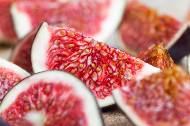 istock sliced ripe fresh purple figs, close up 1492247239