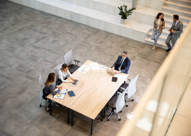 istock Aerial view at young startup team working in the office 1492248083