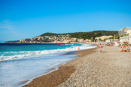 NICE, FRANCE - SEPTEMBER 25, 2018: Plage Blue Beach is a main beach in Nice city, Cote d'Azur region in France