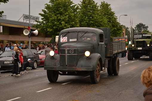 Jule 13, 2012, Finland. Farmer's festival. Old truck drives down a city street, a farmer's festival in Finland