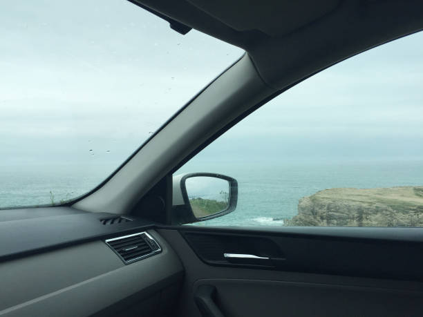 Car interior, car point of view seascape