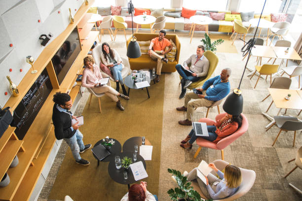 istock Diverse Group Of People At A Business Meeting In A Modern Office 1492267607