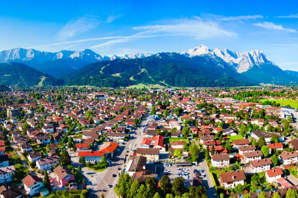 Garmisch-partenkirchen and Zugspitze mountain aerial panoramic view. Garmisch Partenkirchen is an Alpine ski town in Bavaria, southern Germany.
