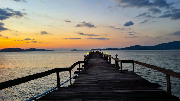 istock Sunset Glow view scene On the  Beach Footbridge Walk 1492272489