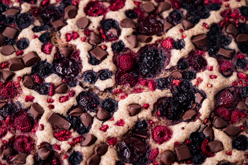 Homemade healthy vegan snack:  organic raspberry, blueberry, blackberry & cherry chocolate whole wheat pancake.  Vancouver, British Columbia, Canada