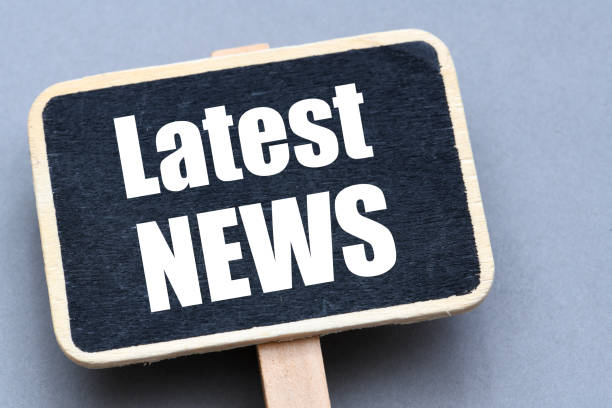 istock Latest NEWS words on a small black chalk board. 1492275963