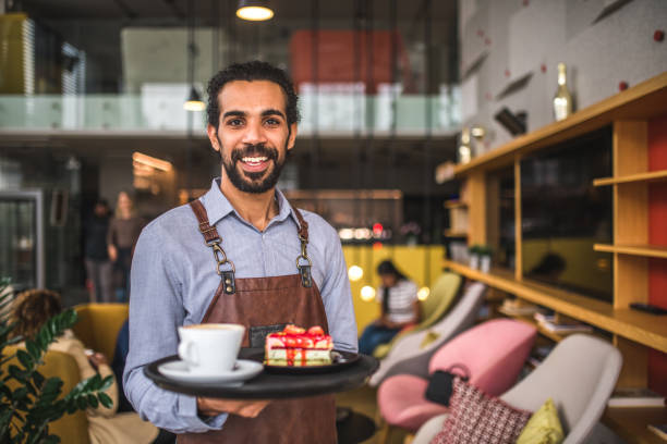 istock Middle Easter Waiter Holding A Serving Tray In A Cafe 1492278305