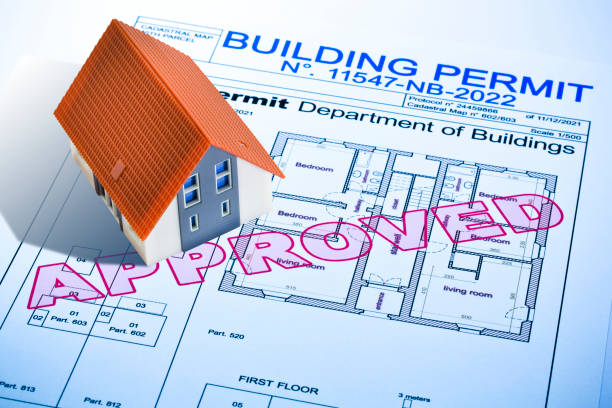 Approved Buildings Permit concept with approved residential building project and home residential building model stock photo