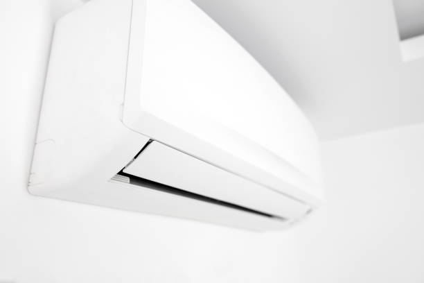 istock Modern air conditioner for cooling or heating home. 1492283170