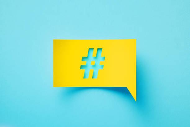 istock Hashtag Symbol Written Yellow Speech Bubble Over Blue Background 1492283175