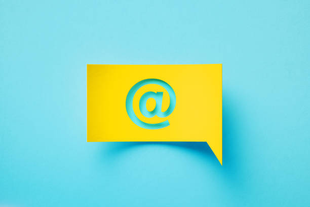 istock At Symbol Written Yellow Speech Bubble Over Blue Background 1492283356