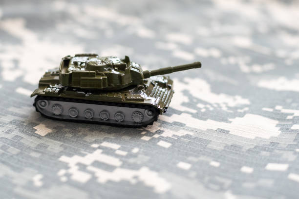 istock military tank and green camouflage 1492284665