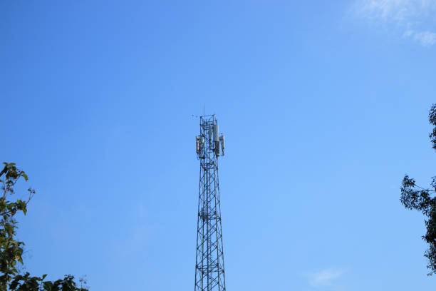 istock Communication Tower with Antenna and GSM from operator signals in Indonesia under the bright blue sky 1492286983