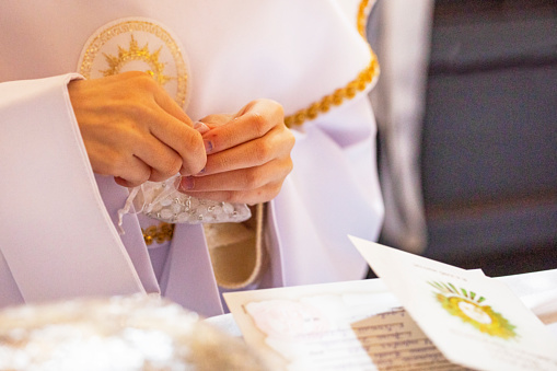 chrisam oil in a vessel and holy water in a bowl. Preparation for the sacrament baptism