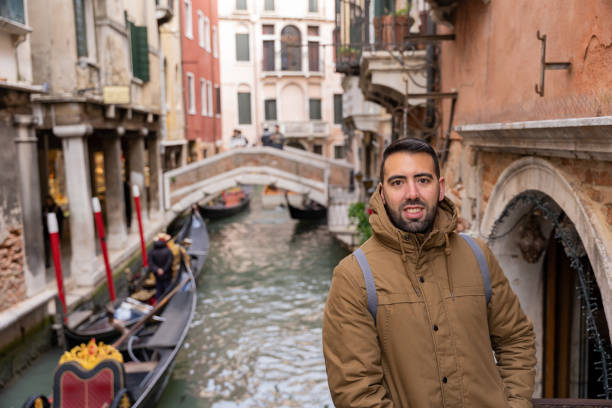 istock Young male tourist visiting Venice canals 1492288975
