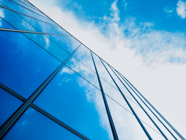 istock Modern building Glass facade with Sky reflection Architecture details 1492289303