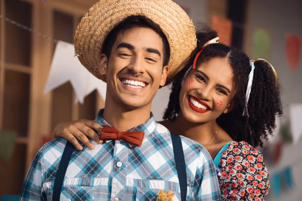 man and woman celebrating at traditional event in costume Brazilian Festa Junina, happy man and woman celebrating at traditional event in costume 21 24 months stock pictures, royalty-free photos & images