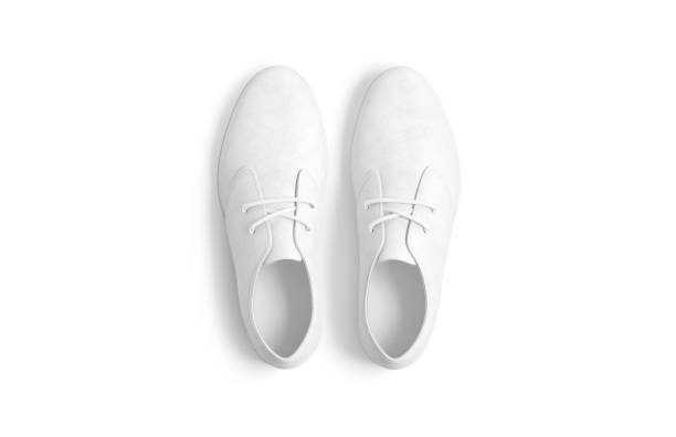 istock Blank white casual shoes mockup, top view 1492290356