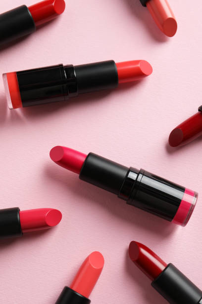 istock Many bright lipsticks on pink background, flat lay 1492291498