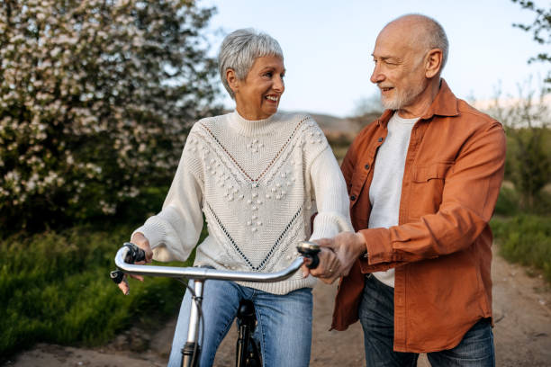 istock Husband Pushing Wife on Bicycle 1492293004