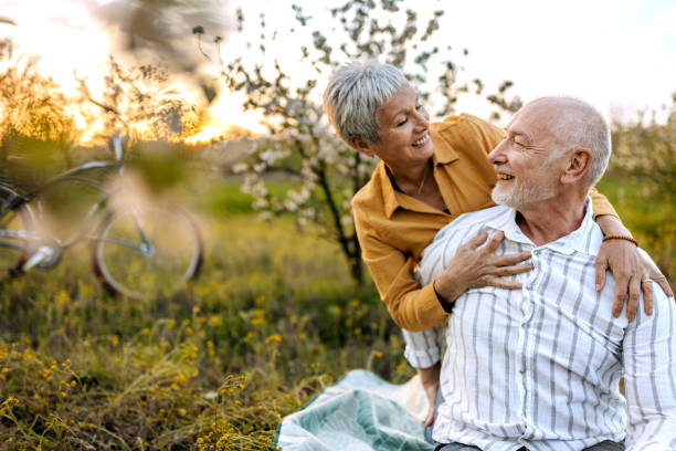 istock Senior couple having a great time on a picnic 1492295876
