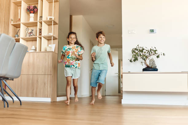 istock Beautiful children running in the apartment 1492299991