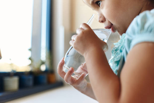 istock Beautiful girl drinking water 1492300199