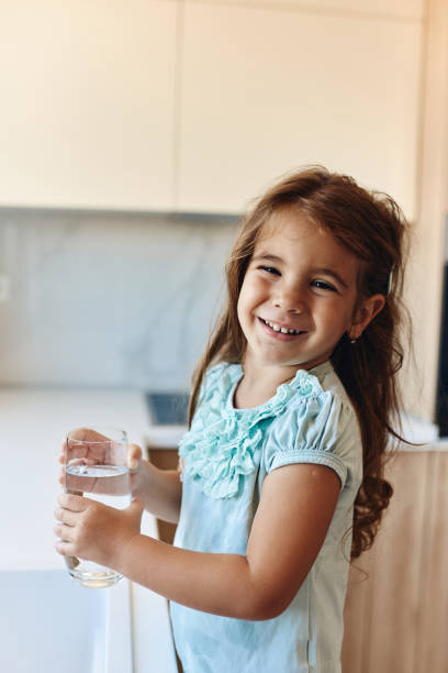 istock Beautiful girl drinking water 1492300351