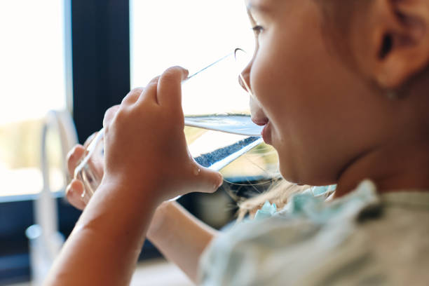 istock Beautiful girl drinking water 1492301589