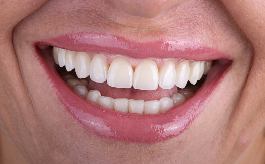 Close-up shot of female smiling.