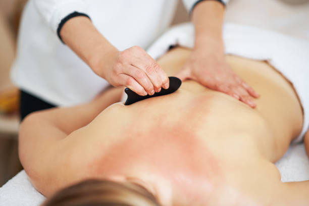 istock Woman having a gua sha massage in salon 1492303966