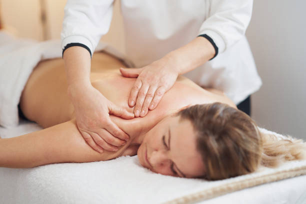 istock Woman having back body massage in studio 1492304250
