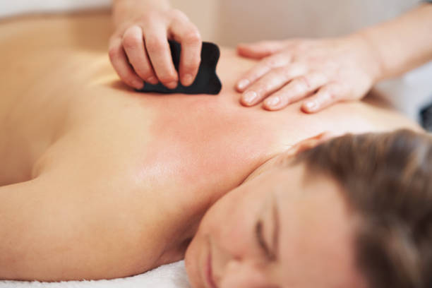 istock Woman having a gua sha massage in salon 1492304758