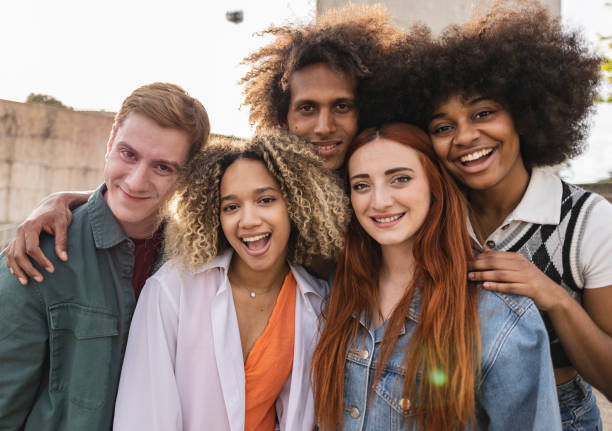 istock group portrait of multiethnic friends looking at camera 1492305399