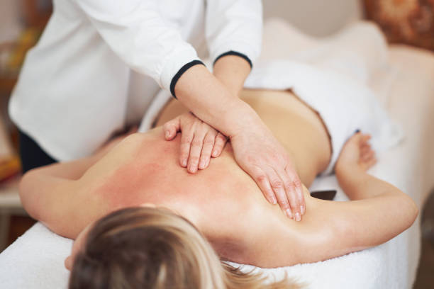istock Woman having back body massage in studio 1492305744