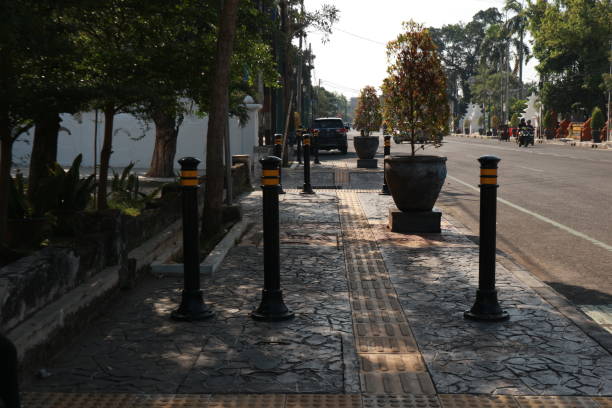 istock road divider on the sidewalk that functions to prevent motorized vehicles from going up to the pedestrian area 1492308137