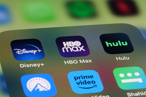 Shanghai,China-May 21st 2023: close up HBO Max, Disney+ and hulu app icon on screen. Streaming service of Warner Bros. Discovery and Disney Entertainment