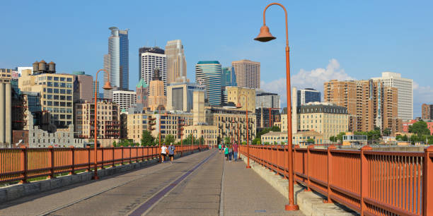 istock Minneapolis Skyline + Stone Arch Bridge 1492312972