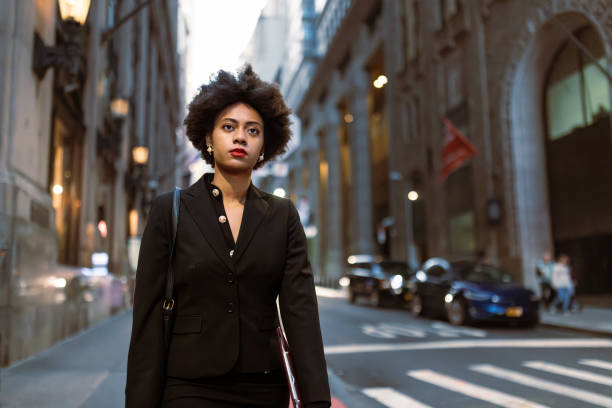 istock On the Go: Multitasking Businesswoman Rushing to a Meeting 1492315285