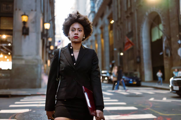 istock On the Go: Multitasking Businesswoman Rushing to a Meeting 1492315345