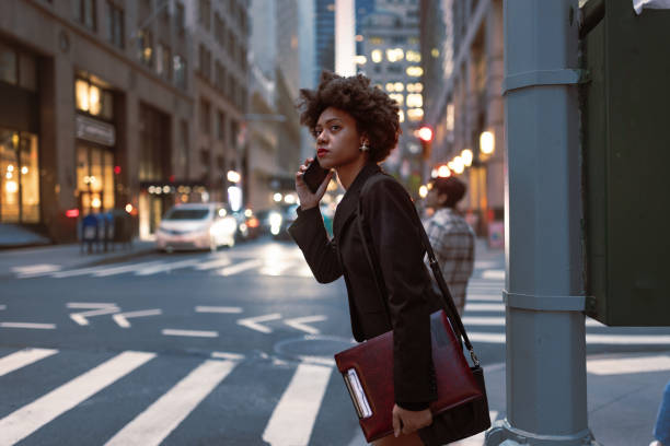 istock Busy and Focused: Young Black Professional on Wall Street 1492315566