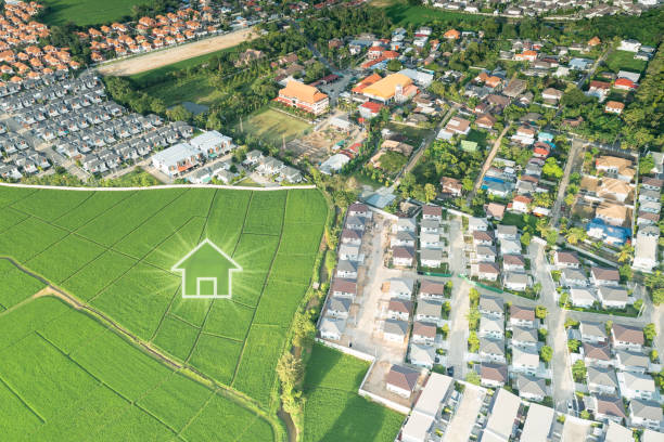 istock Green fields and dream house in aerial view. 1492319392