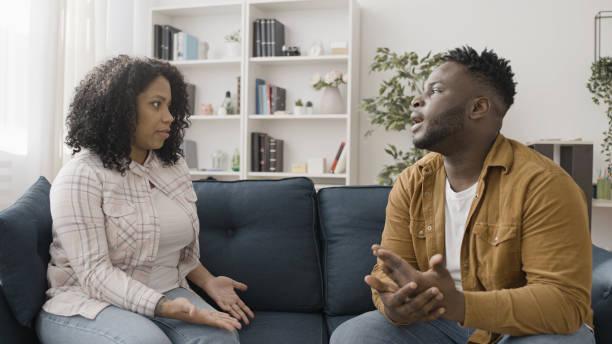 istock African American couple discussing their problems at couple's therapy, argument 1492319816