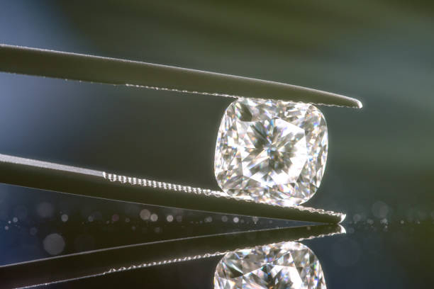 istock Diamond in Jewelry Tweezers 1492328391